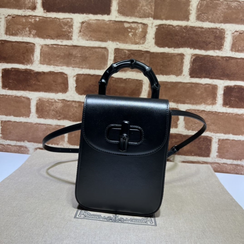 G*u*i top handle bags